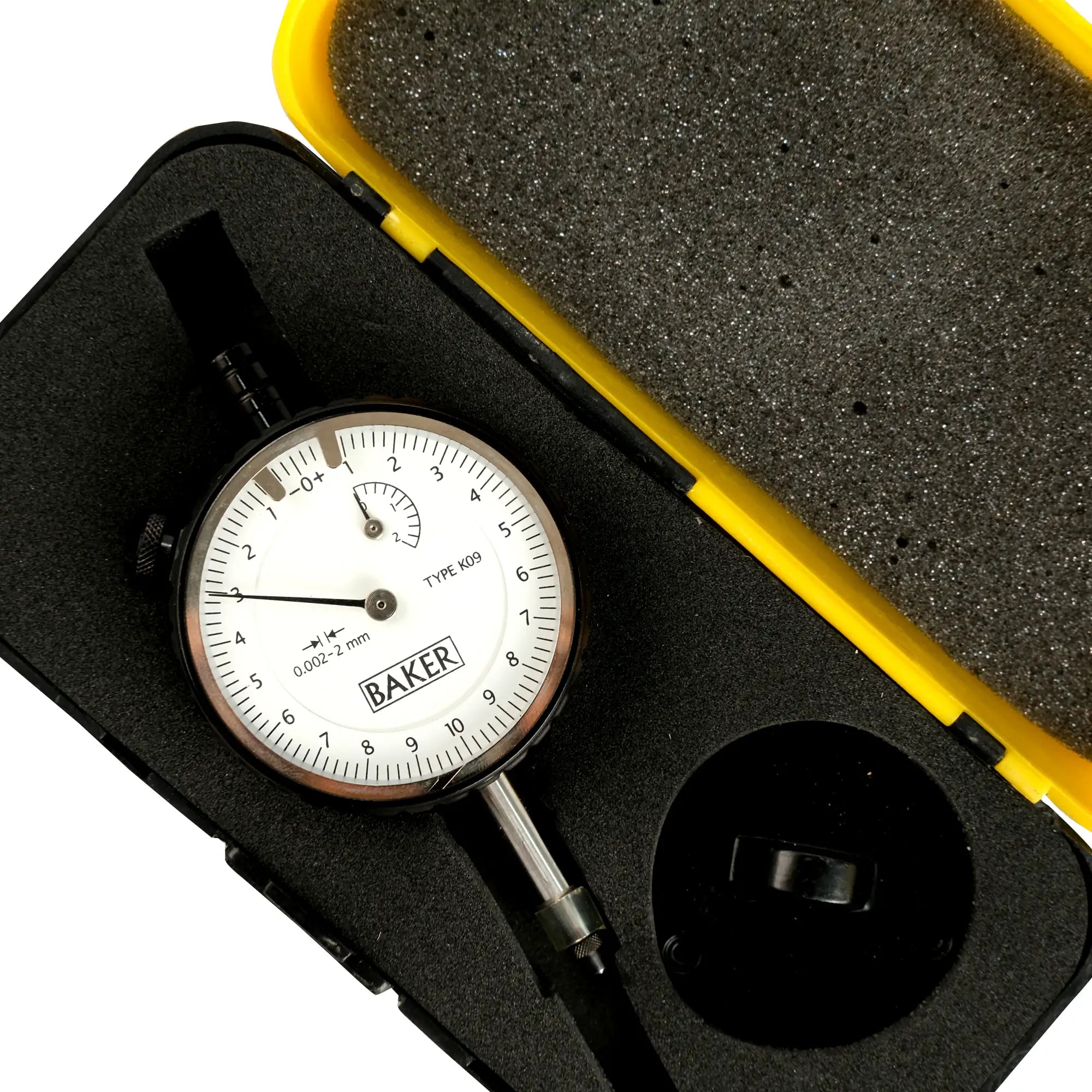 Baker dial indicator in a black and yellow case