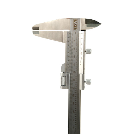 A silver-colored Baker VCF-20 vernier caliper with a range of 0-180 mm, featuring hardened and ground stainless steel jaws and a measurement scale.