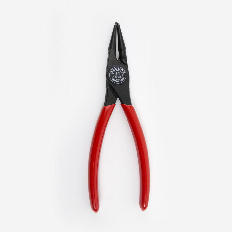 Pair of pliers with red handles on a white background